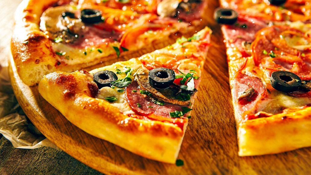 Włoski smak, światowa popularność. Przepis na oryginalną pizzę capricciosa